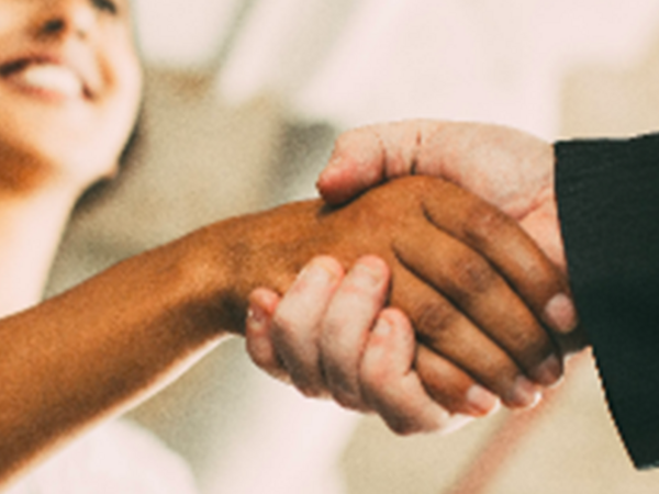 Two people shaking hands